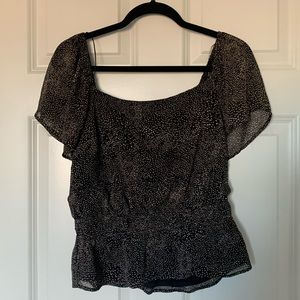 Medium black peplum shirt.